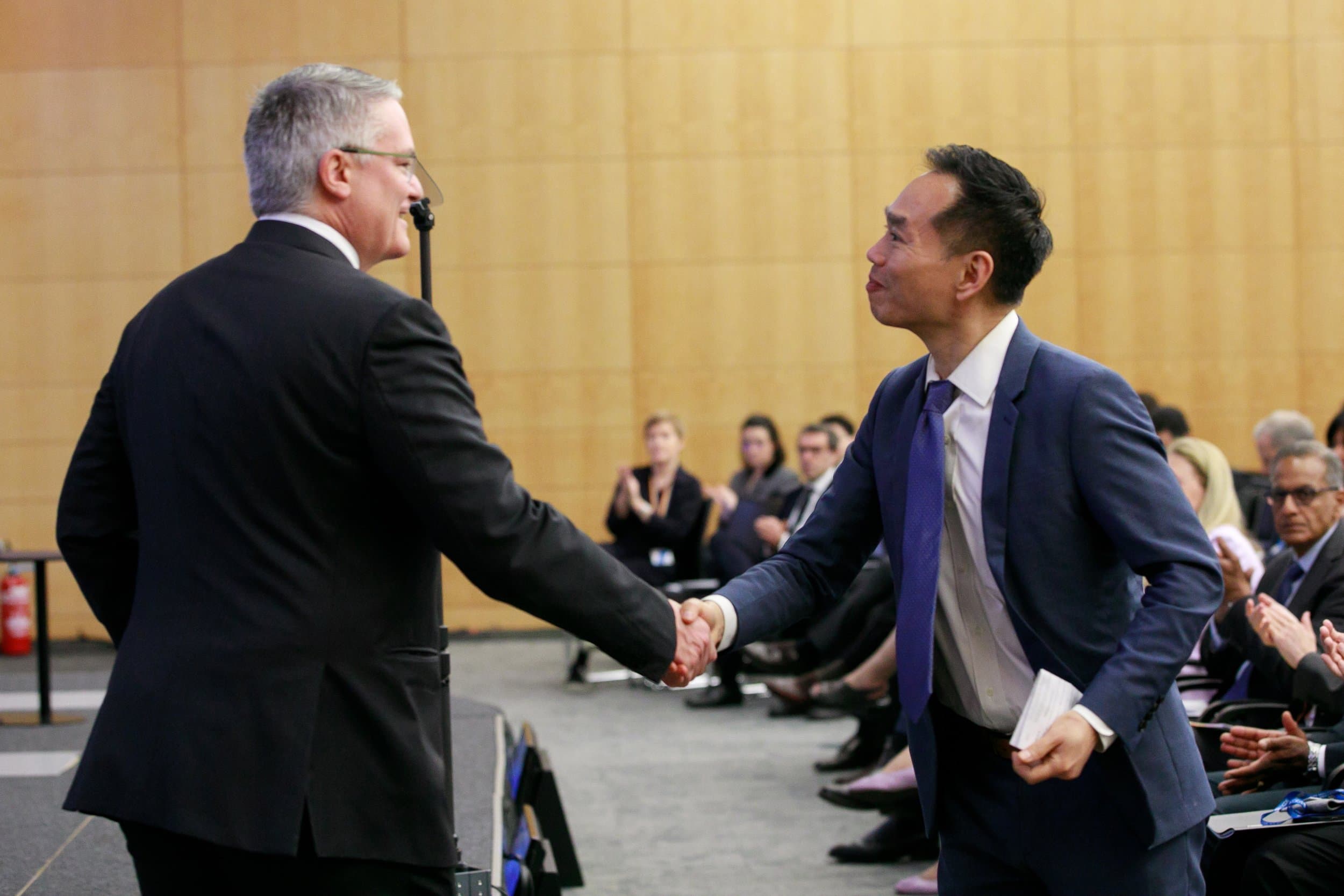Mathias Cormann and Edwin Lau